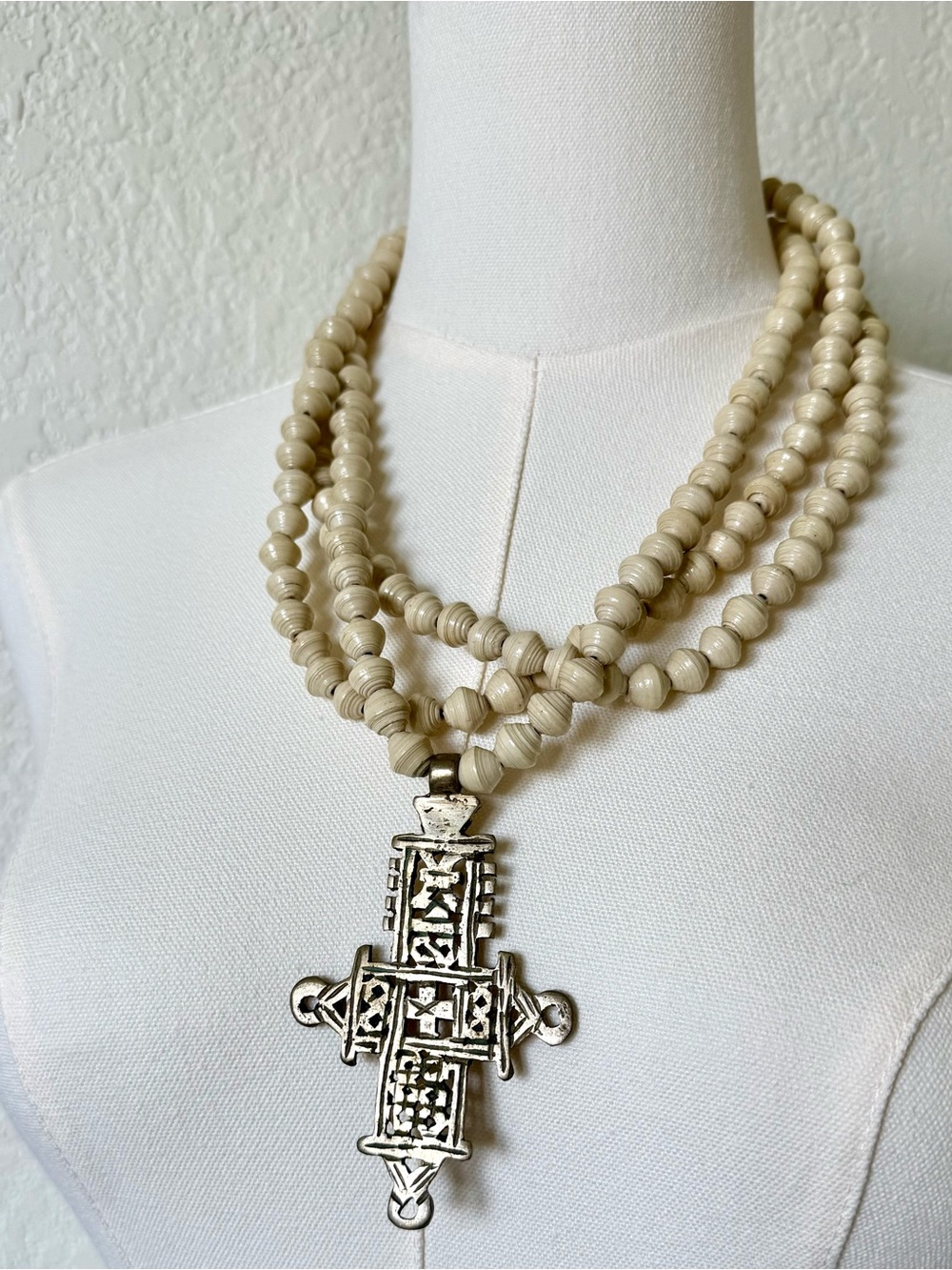 Akola Multi-Strand Cream Beaded Necklace with Pendant